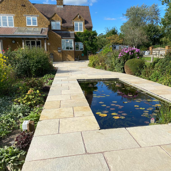 modern garden pond design and paving